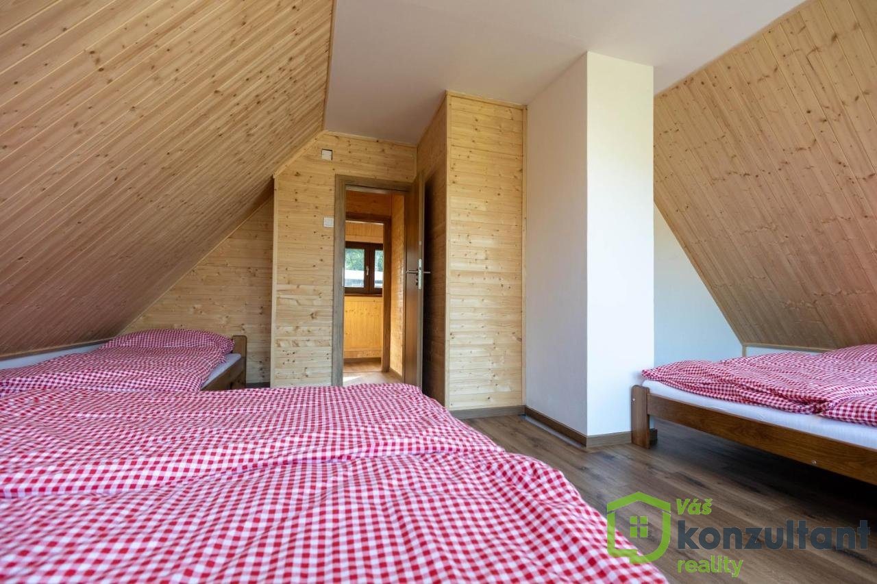 Podkrovní ložnice s panoramatickým výhledem