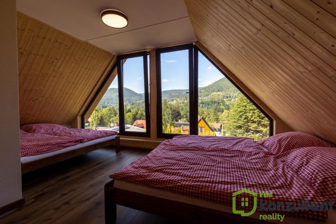Podkrovní ložnice s panoramatickým výhledem